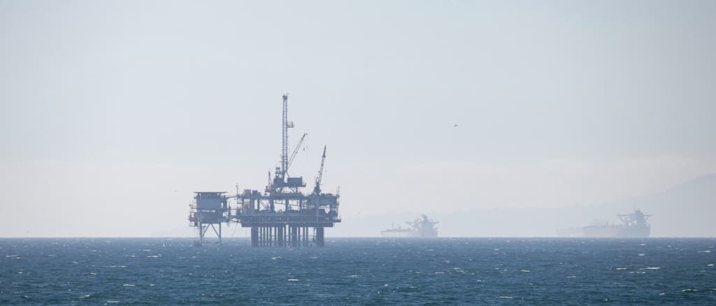 Offshore platform on a calm, hazy sea