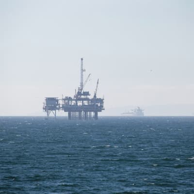Offshore platform on a calm, hazy sea