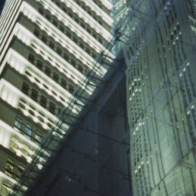 Office towers and glass reflections at night